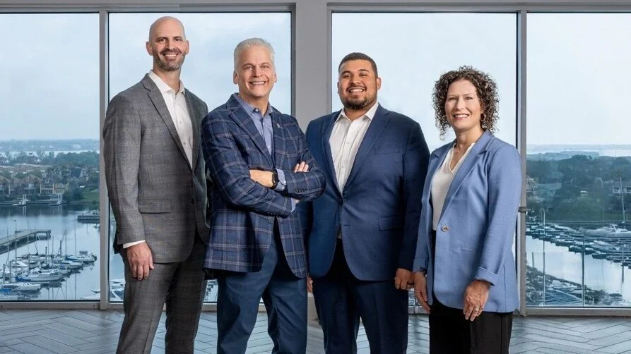Burrows Financial leadership team Clint Auttonberry, Don Burrows, Rolando Villarreal and Ashley Villarreal